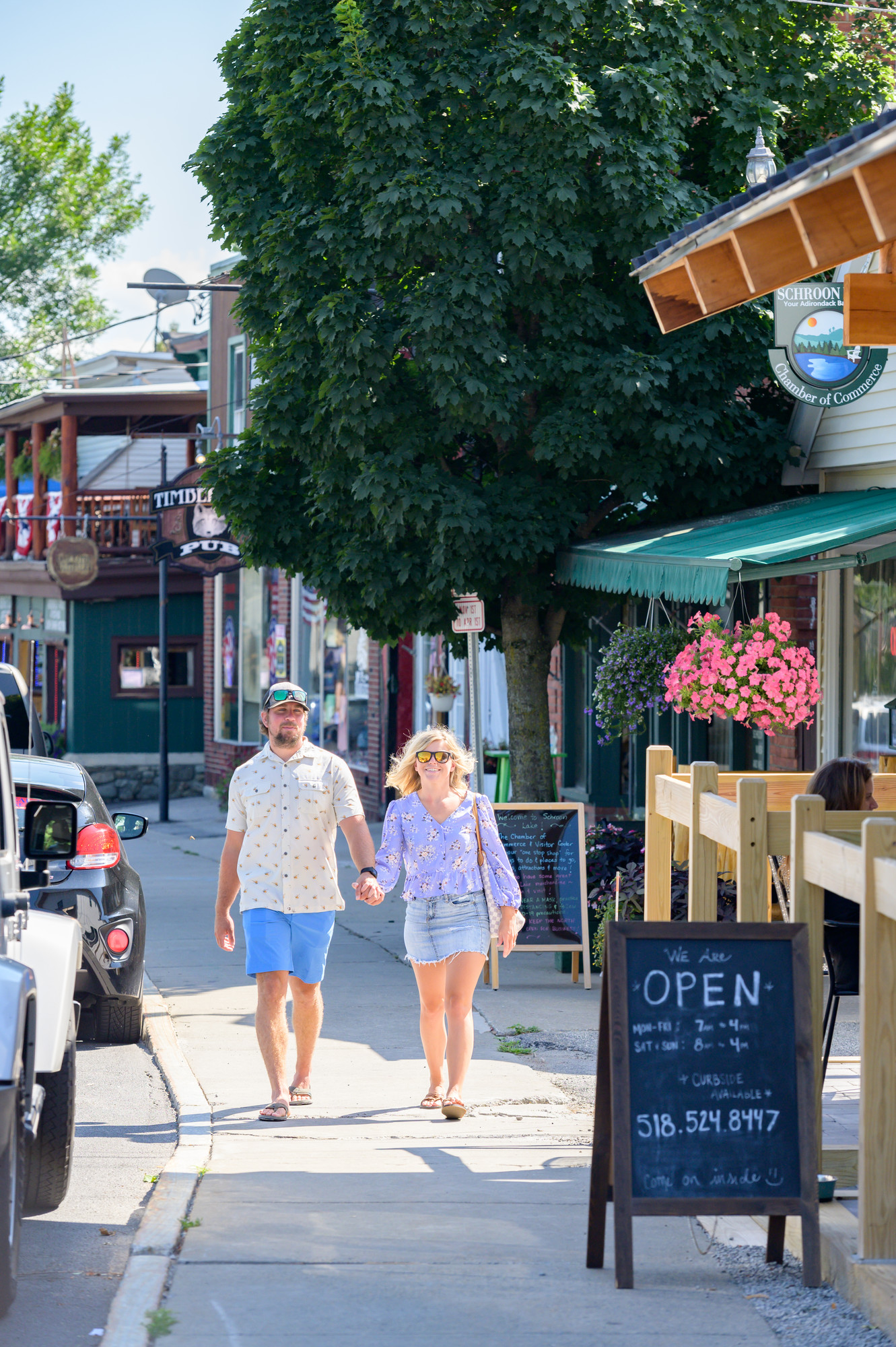 two people walking down main st