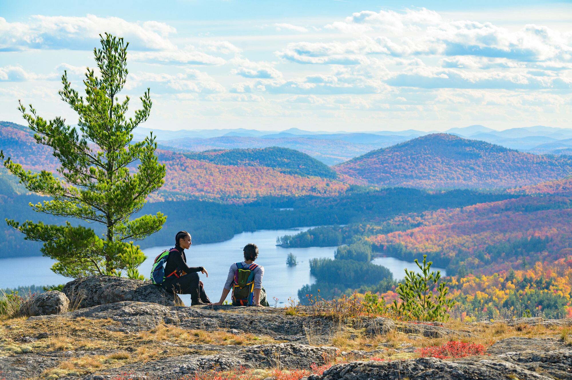 a couple looking out at Treadway Mountain